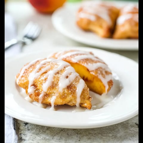 A plate of pastries with a white plate.